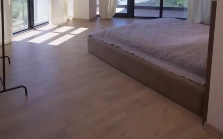 Empty apartment ready for move-in with floor-to-ceiling windows