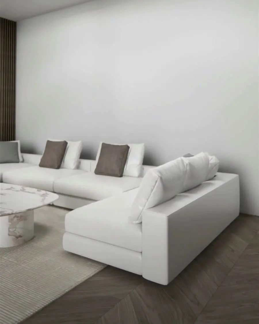 Clean modern living room with a white sofa